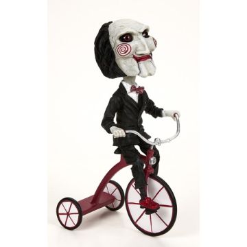 Saw – Head Knocker – Puppet on Tricycle